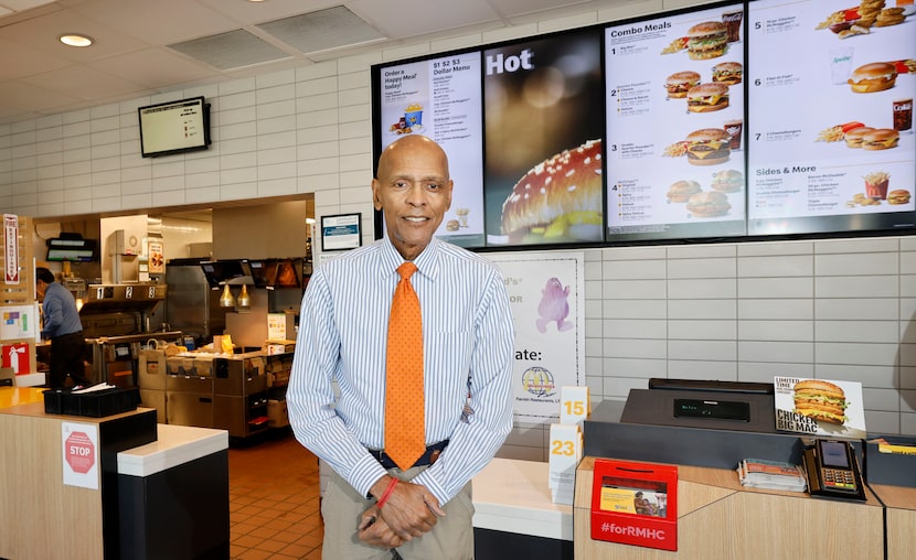 Roland Parrish, who owns more than two dozen McDonald's franchise restaurants, poses for a...