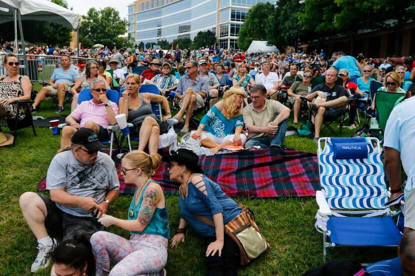 The crowd gathers for singer Leon Russell's performance on the Amphitheater Stage at the...