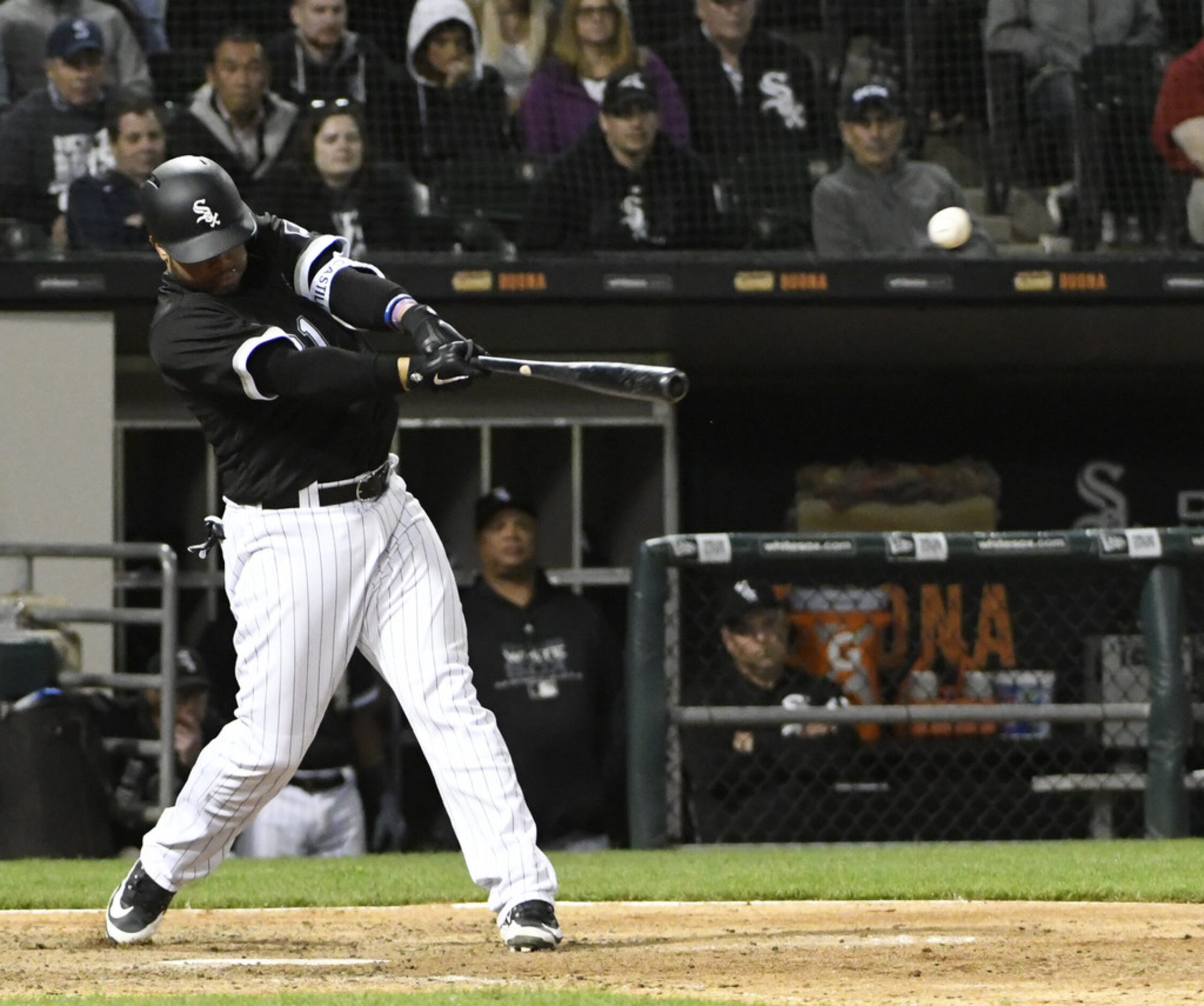 CHICAGO, IL - MAY 17: Welington Castillo #21 of the Chicago White Sox hits a two-RBI single...