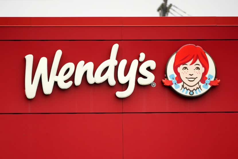 The Wendy's sign is seen at a restaurant, Jan. 23, 2023, in Pittsburgh. Wendy's is looking...