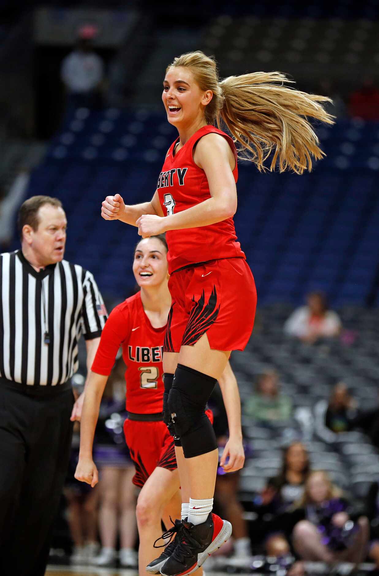Frisco Liberty guard Lily Ziemkiewicz #3 celebrates after turnover in OT in a 5A semifinal...