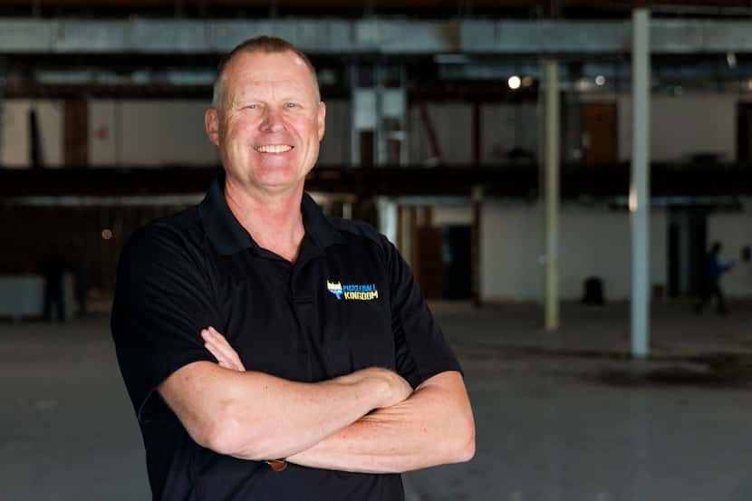 Entrepreneur Dan Jenkins stands inside Pickleball Kingdom’s still-under-construction indoor...