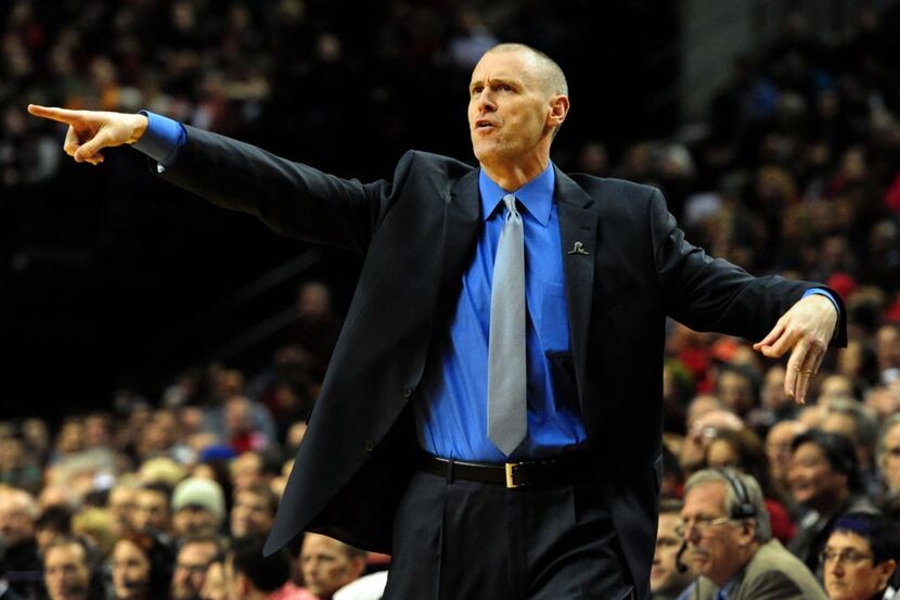 Dec 7, 2013; Portland, OR, USA; Dallas Mavericks head coach Rick Carlisle yells out to his...