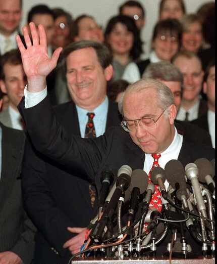 Sen. Phil Gramm, R-Texas, acknowledges applause on Capitol Hill on Feb. 14, 1996 after...