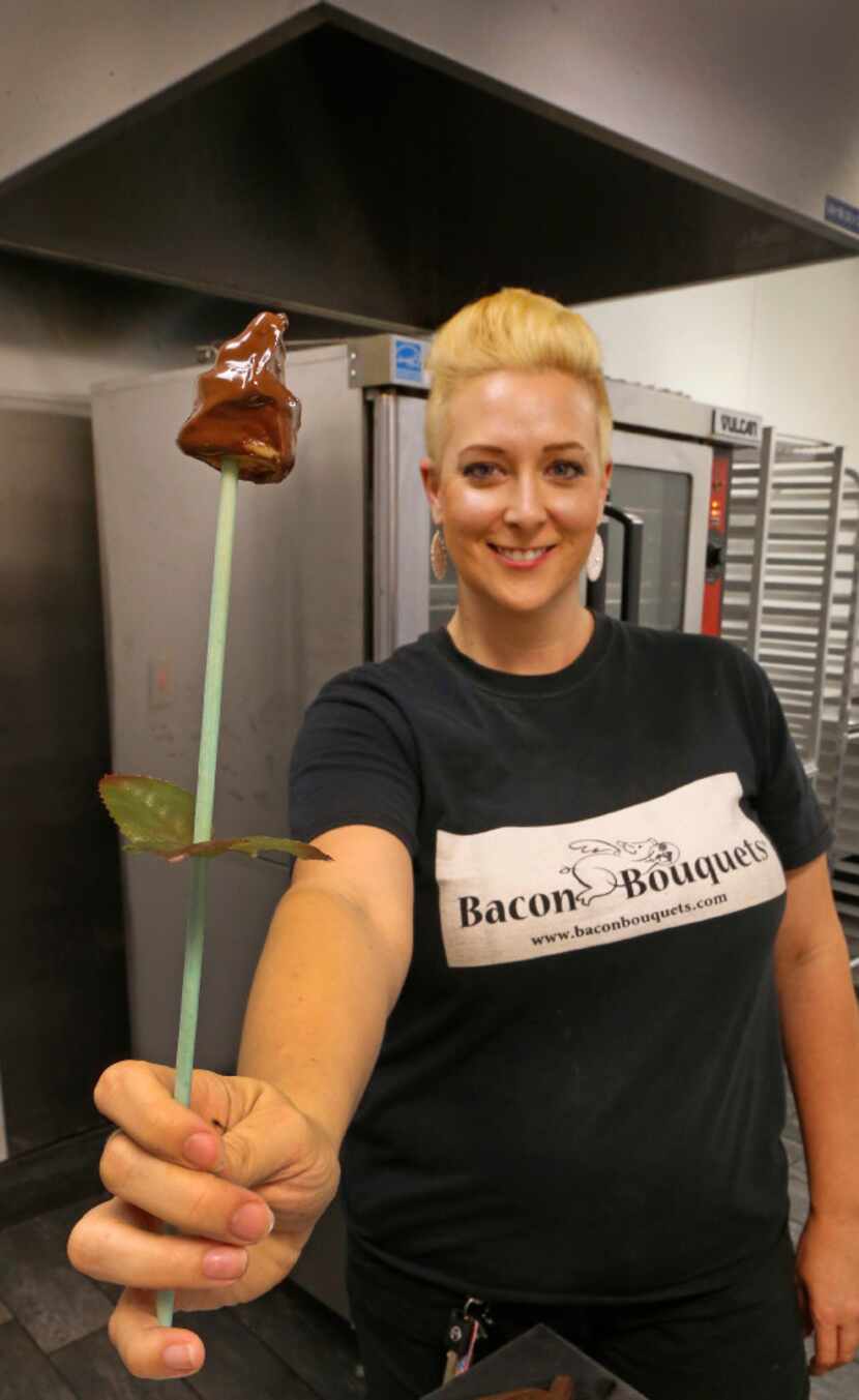 Meredith Browning holds a chocolate-dipped bacon rose, which she makes for her business,...