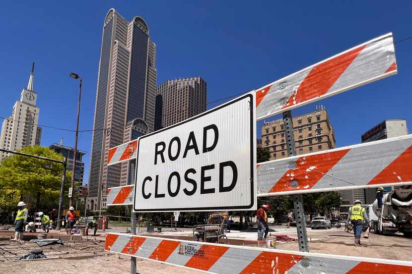 A road closed sign blocks off a downtown Dallas street in April 2023.
