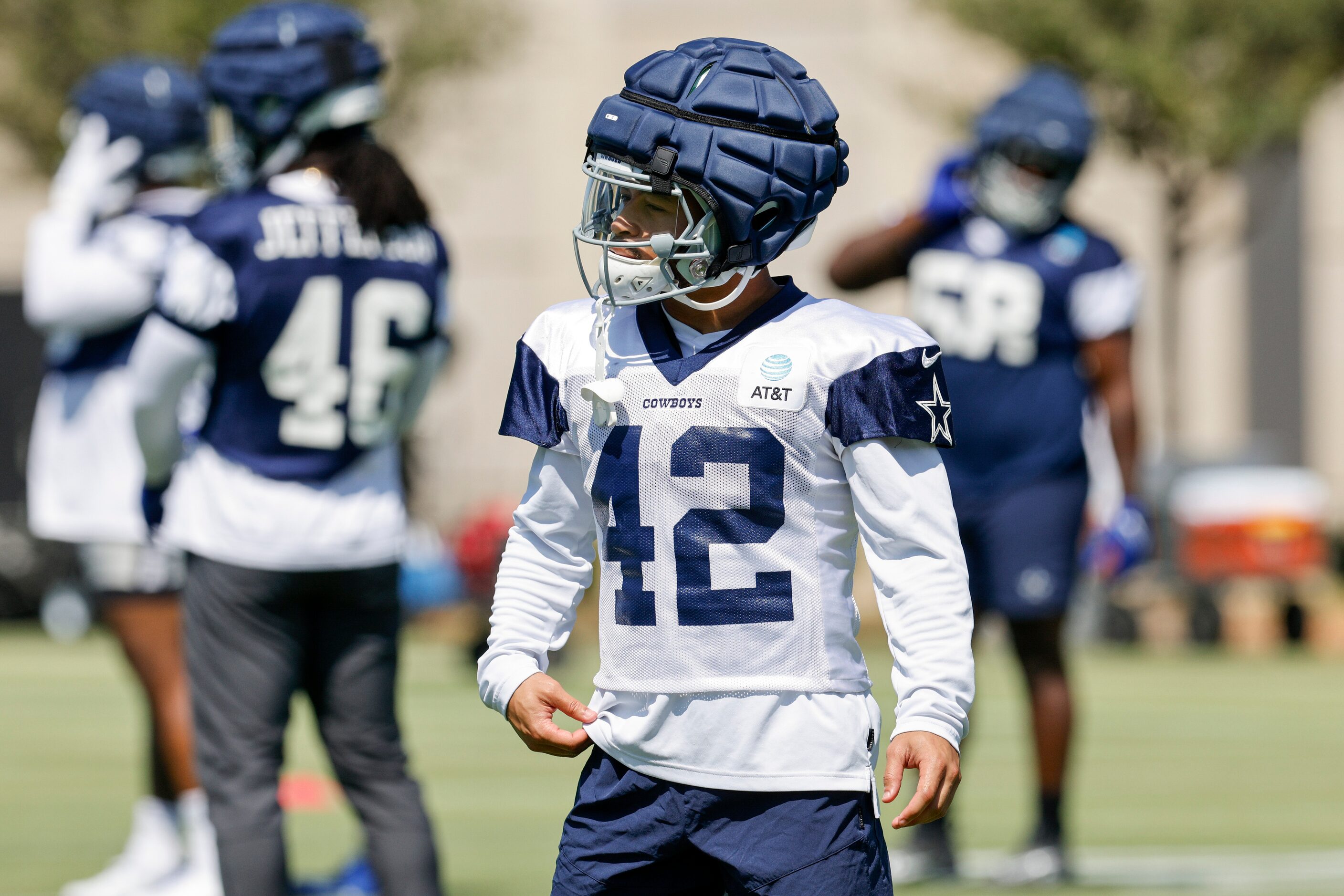 Dallas Cowboys running back Deuce Vaughn (42) warms up during a practice at The Star,...