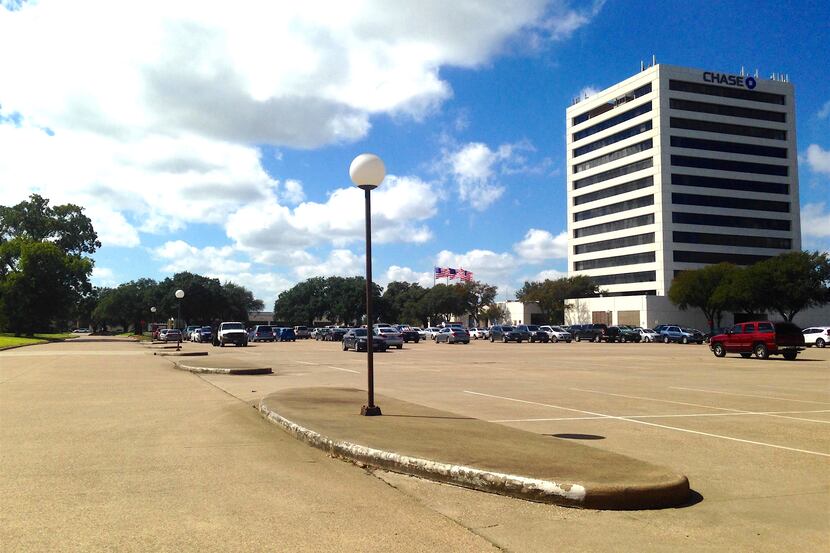 The planned Town Central development would surround the Chase Bank building on Main Street...