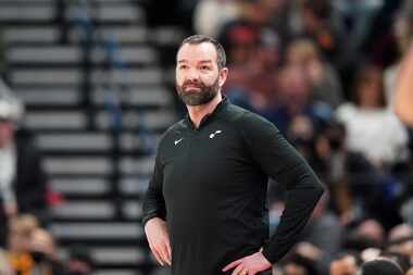 Utah Jazz acting head coach Alex Jensen looks on in the first half during an NBA basketball...