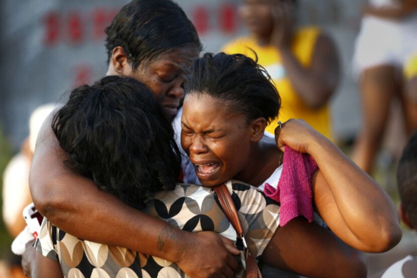 Ashley Harper, sister of shooting victim James Harper, was overcome with emotion Tuesday...