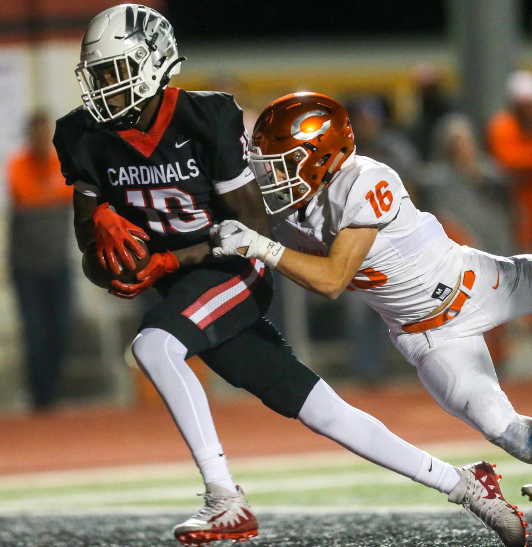 Melissa wide receiver Antonio Robinson (10) hauls in a pass to score a touchdown past Celina...