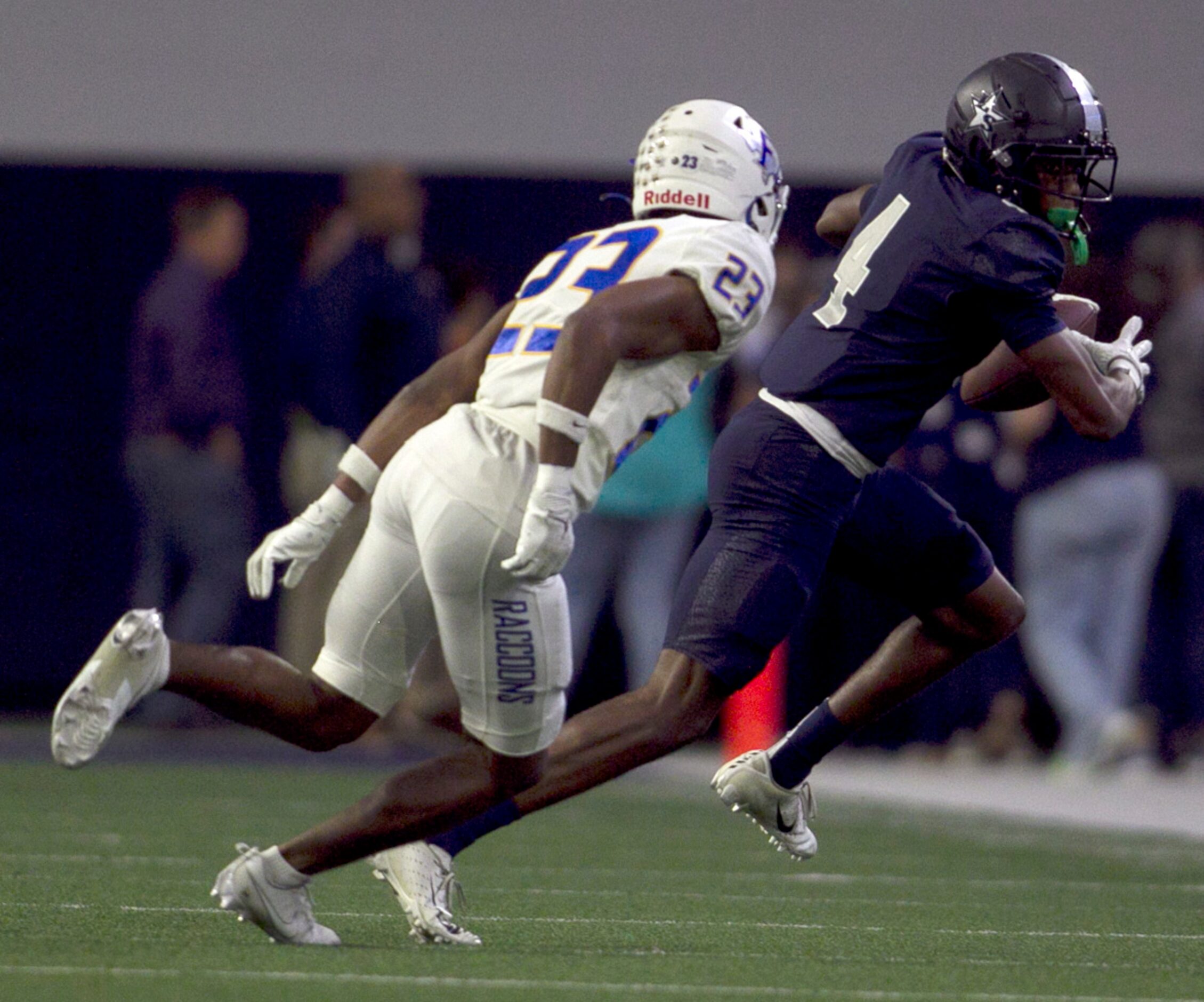 Frisco Lone Star receiver Bryson Jones (4), right, tacks on extra yardage after the catch as...