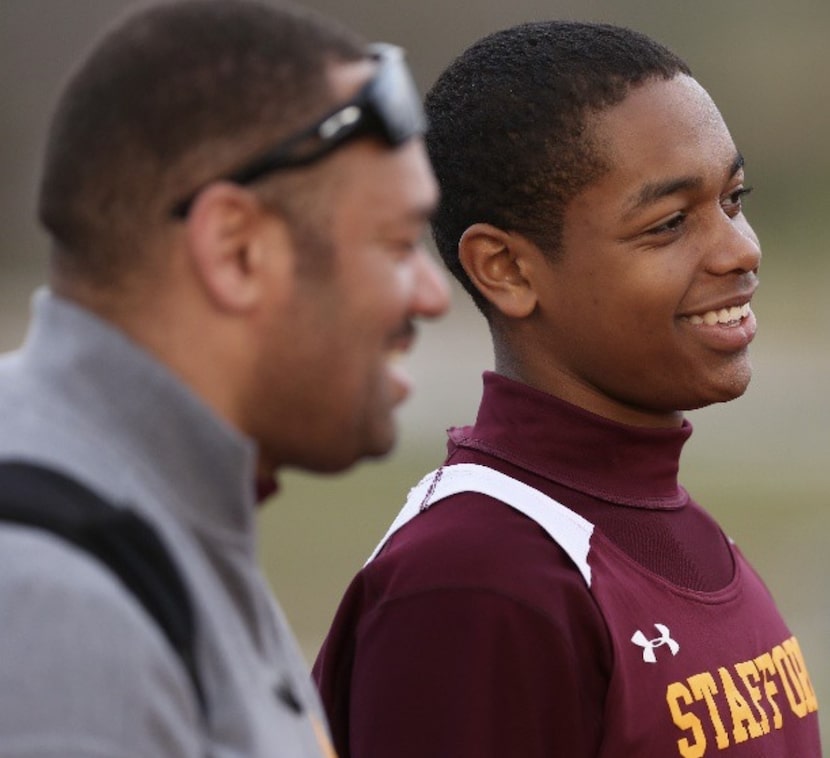 P.J. Washington (right) and his father, Paul J. Washington (left) during P.J.'s days at...