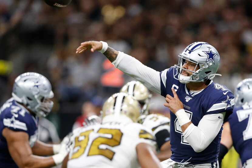 Cowboys quarterback Dak Prescott (4) attempts a pass during the first half of a game against...