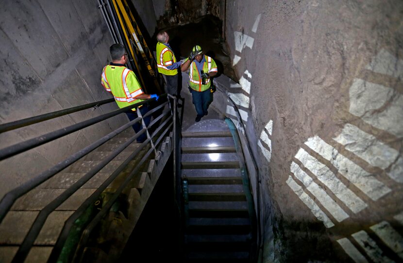 Mechanic Bill Lakes (right) leads the way, followed by DMN real estate editor Steve Brown...