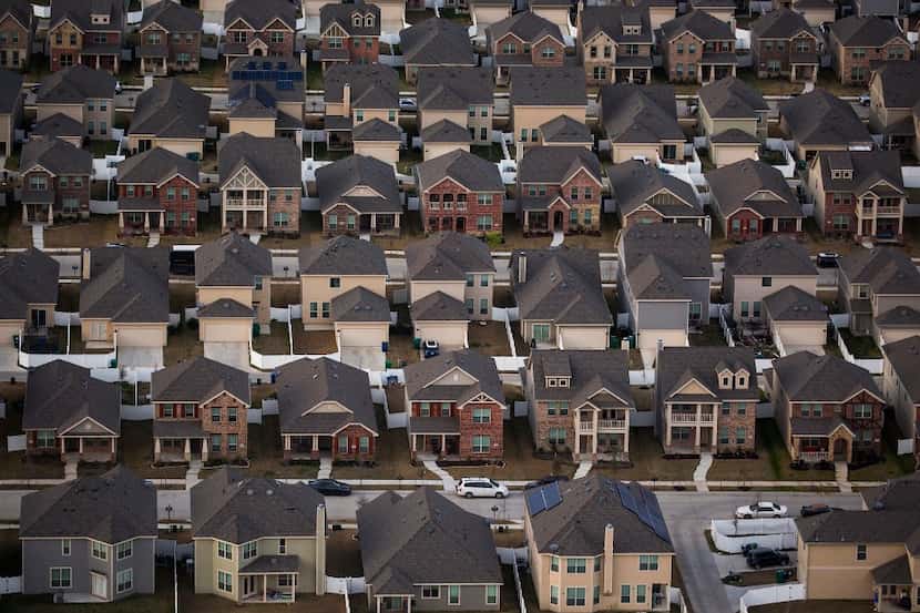 Rows of suburban homes seen in an aerial view on Monday, March 6, 2017, in Aubrey, Texas. 