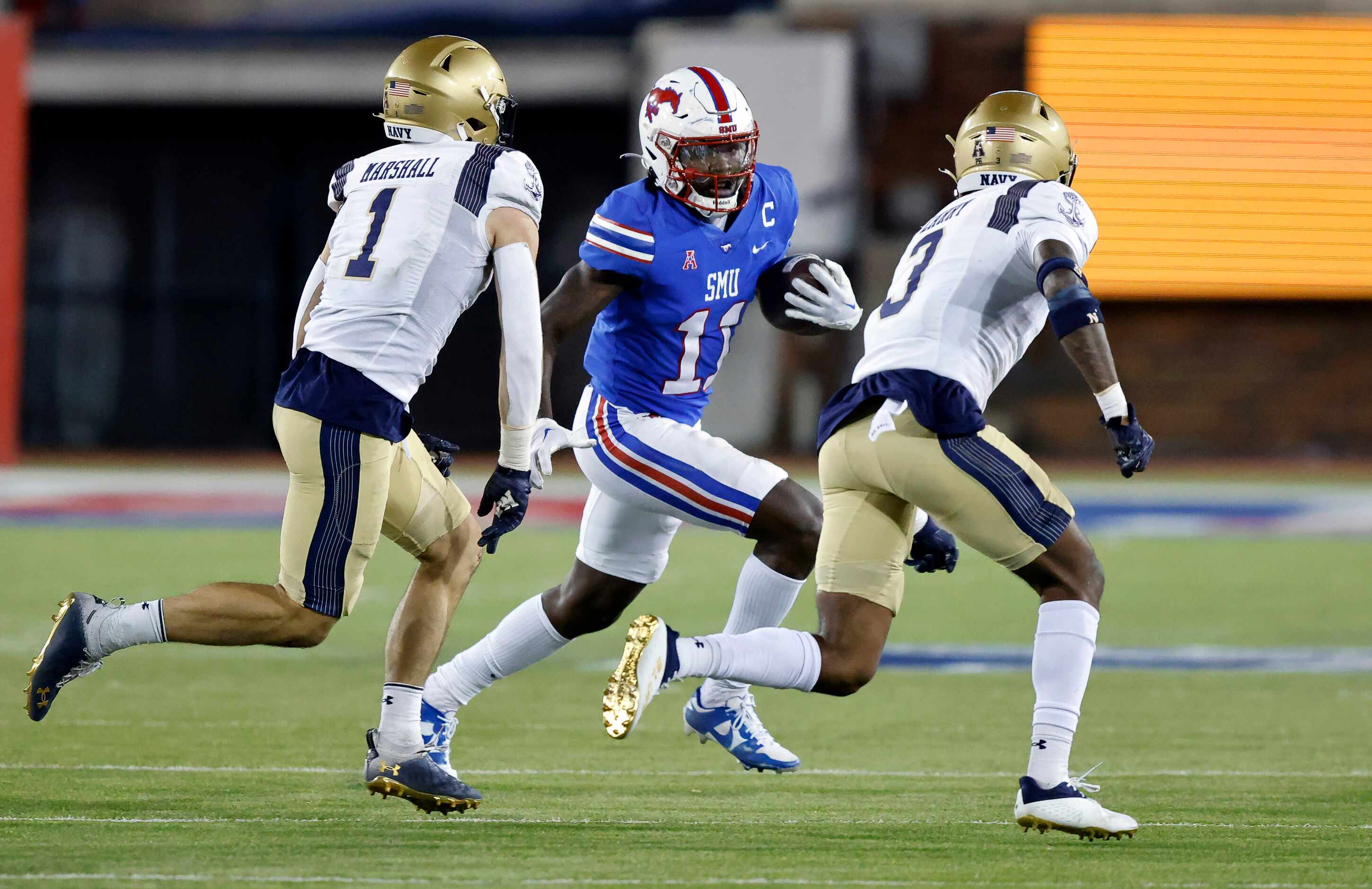 Southern Methodist Mustangs wide receiver Rashee Rice (11) is chased by Navy Midshipmen...