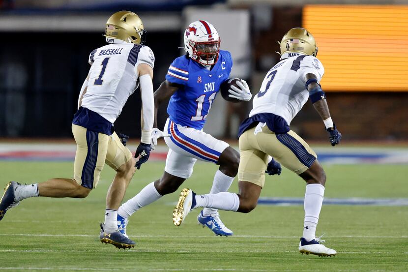 Southern Methodist Mustangs wide receiver Rashee Rice (11) is chased by Navy Midshipmen...