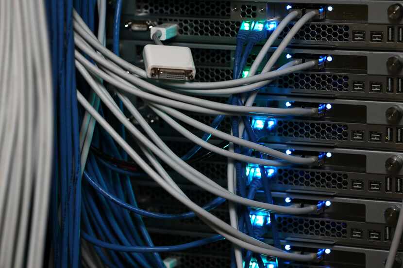 NEW YORK, NY - NOVEMBER 10:  Network cables are plugged in a server room on November 10,...