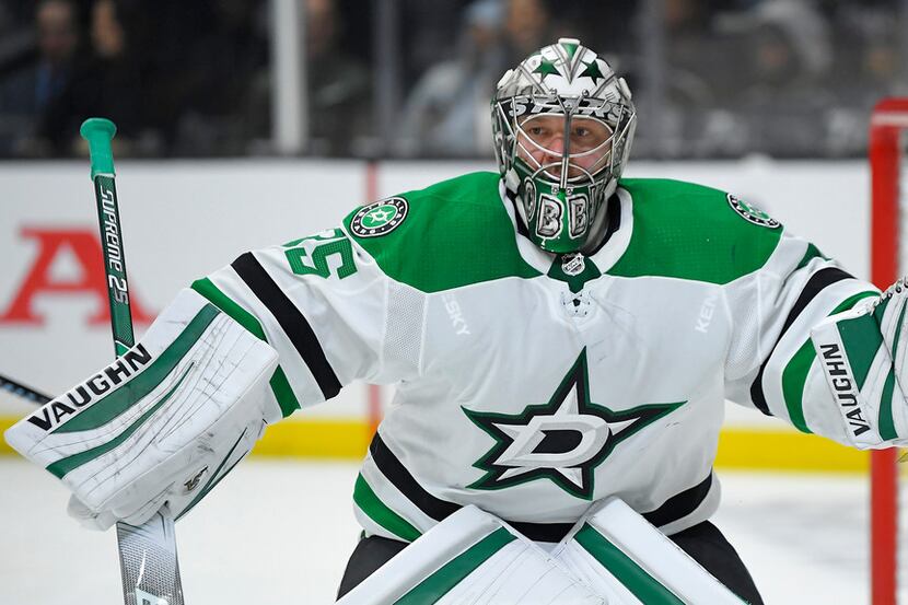 Dallas Stars goaltender Anton Khudobin stands at his goal during the second period of an NHL...