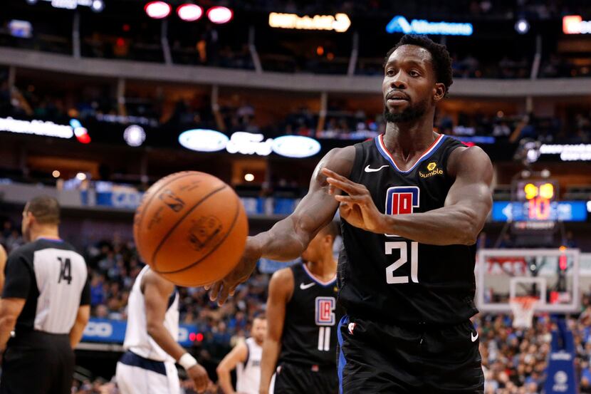 Los Angeles Clippers guard Patrick Beverley (21) throws a ball at a fan during the second...