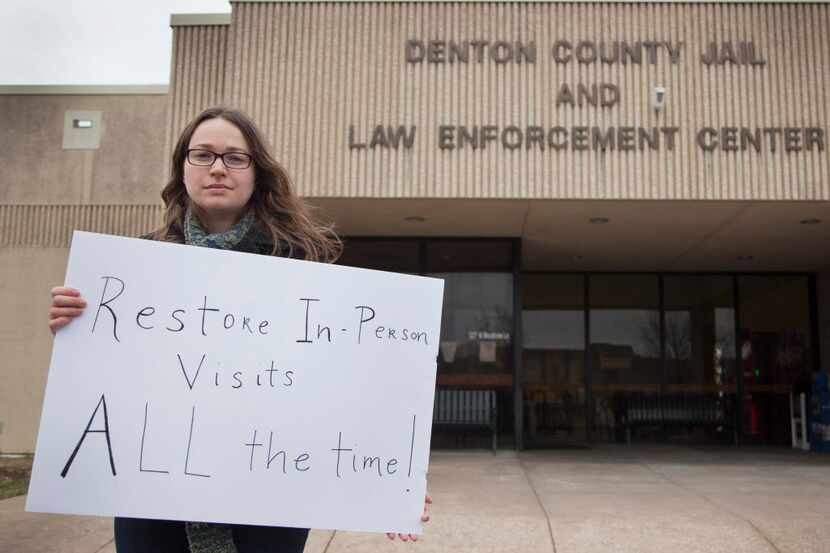  Jennifer Long poses in front of the Denton County Jail in February to protest the video...