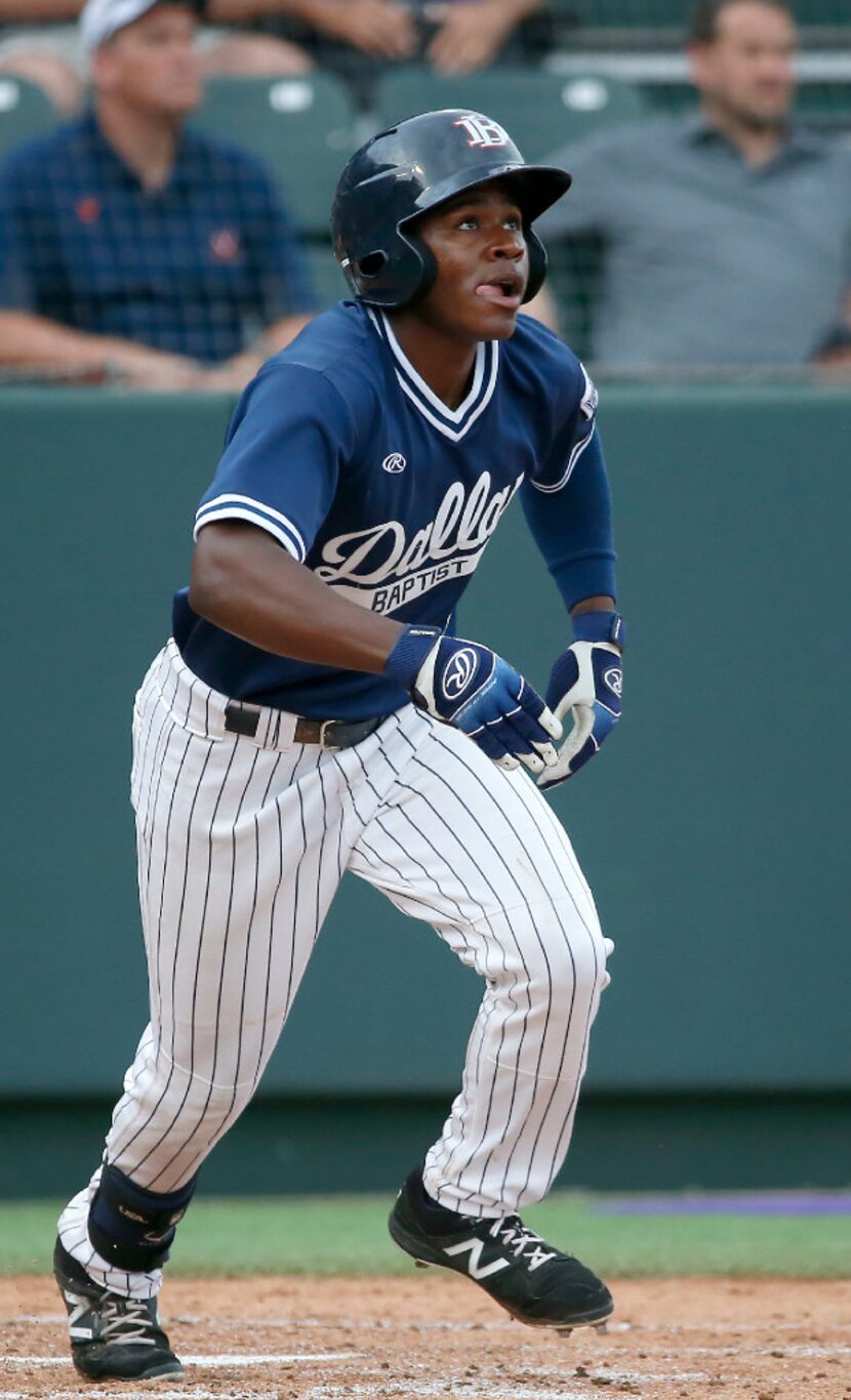 FILE - Dallas Baptist outfielder Jameson Hannah (5) watches his solo home run against...