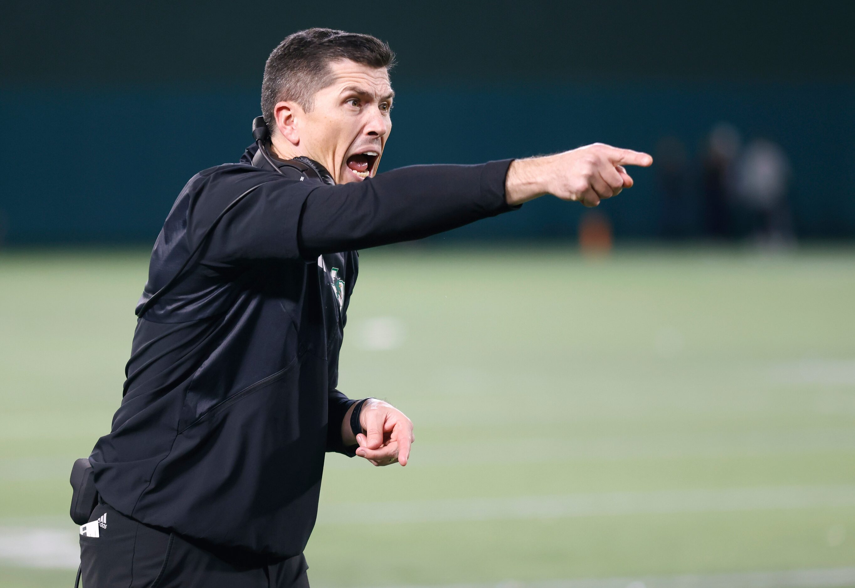 Southlake Carroll head coach Riley Dodge yells to his defense against Highland Park in the...