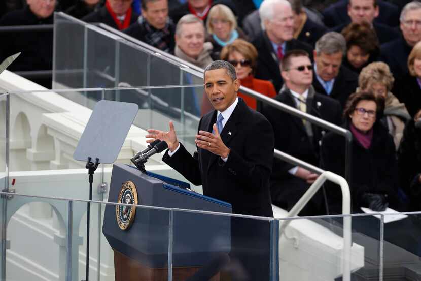 U.S. President Barack Obama gives his inaugural address at his swearing-in ceremony at the...