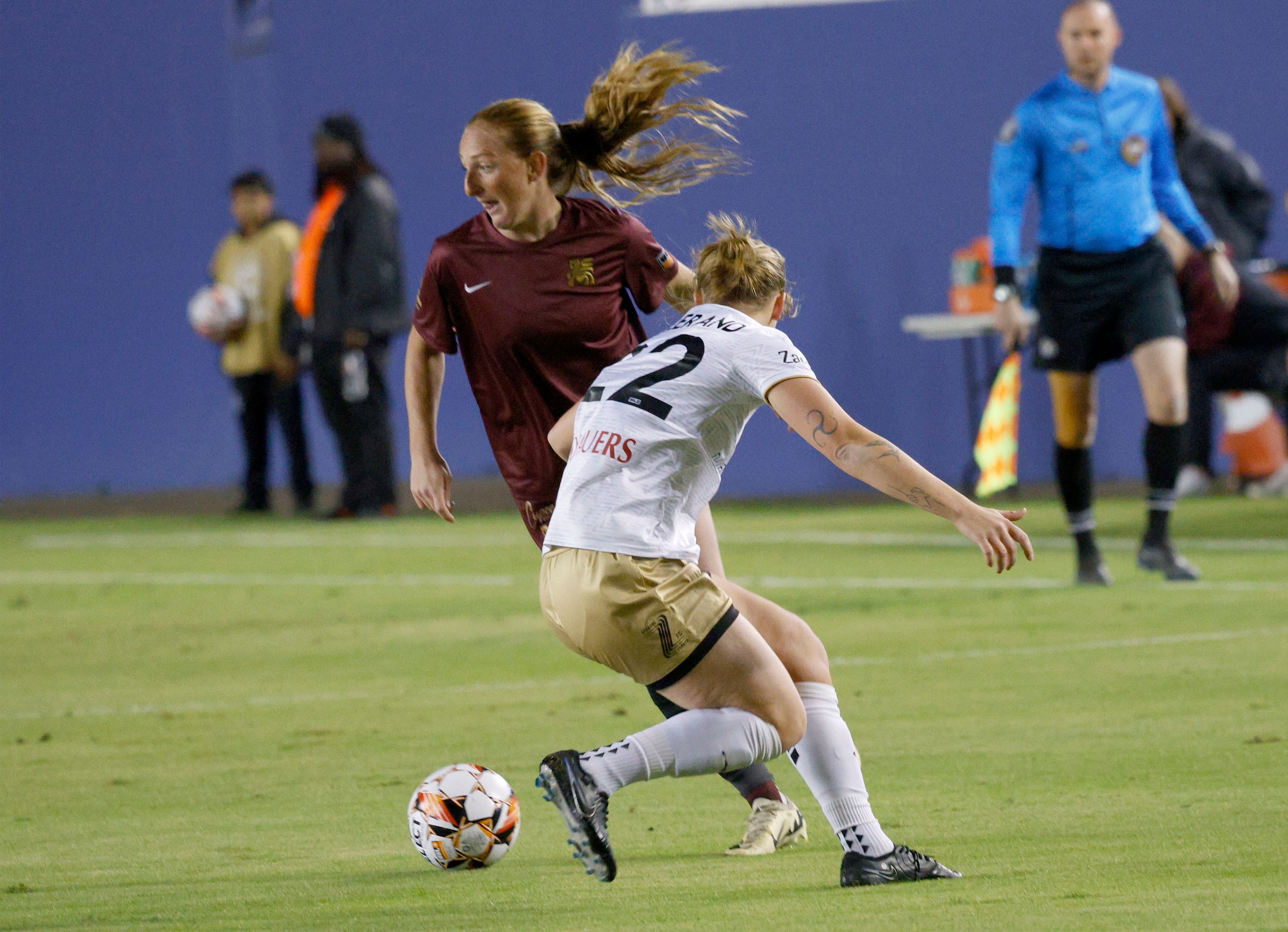 Dallas Trinity forward Rachel McCarthy (33) tries to control the ball against Spokane Zephyr...