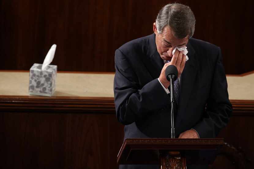 Outgoing Speaker of the House Rep. John Boehner (R-OH) wipes his eye as he gives his...