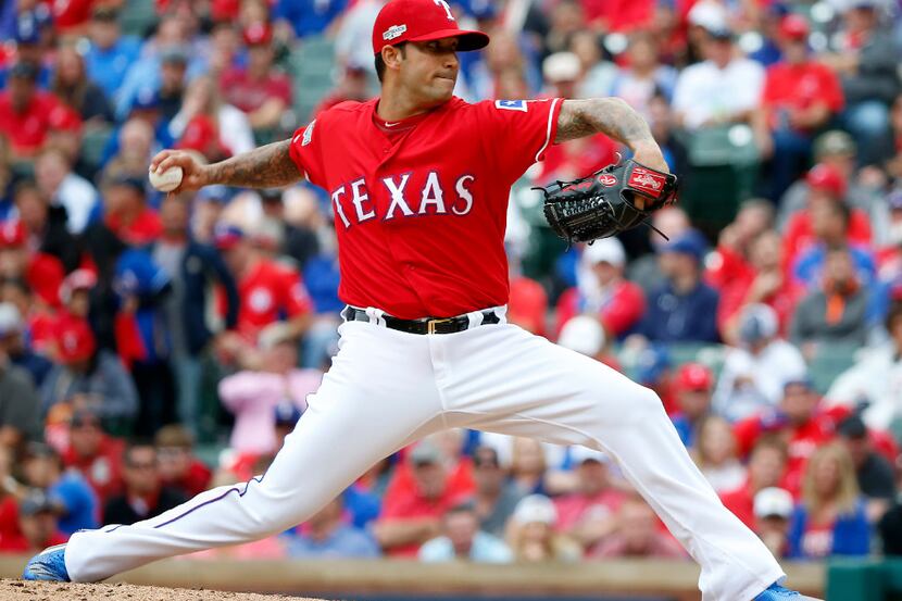Texas Rangers relief pitcher Matt Bush throws a pitch against Toronto Blue Jays during the...