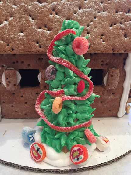 A waffle cone topped with icing was used to create this tree. Froot Loops were used for...