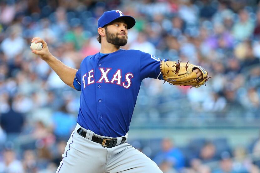 NEW YORK, NY - JUNE 29:  Nick Martinez #22 of the Texas Rangers pitches in the first inning...