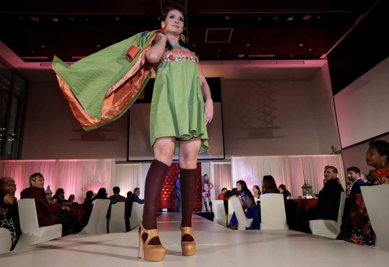 Models walk the runway during the Bollywood to Hollywood charity gala at the University of...