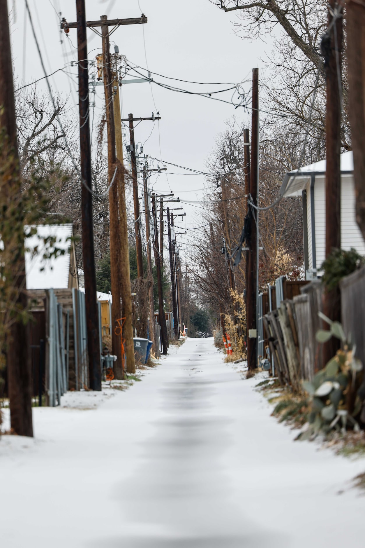 A service alley covered with sleet near Skillman St on Tuesday, Jan. 31, 2023. Weather...