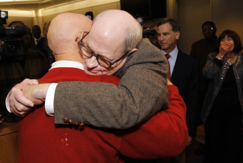 Dale Lincoln Duke hugs his father, George Melville Duke, after he was exonerated and told he...