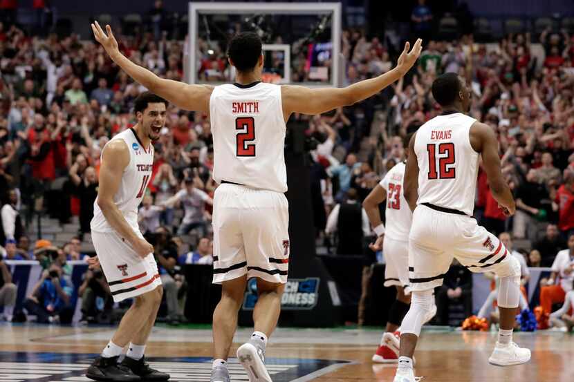 Texas Tech's Zach Smith (11), Zhaire Smith (2) and Keenan Evans (12), celebrate in the...
