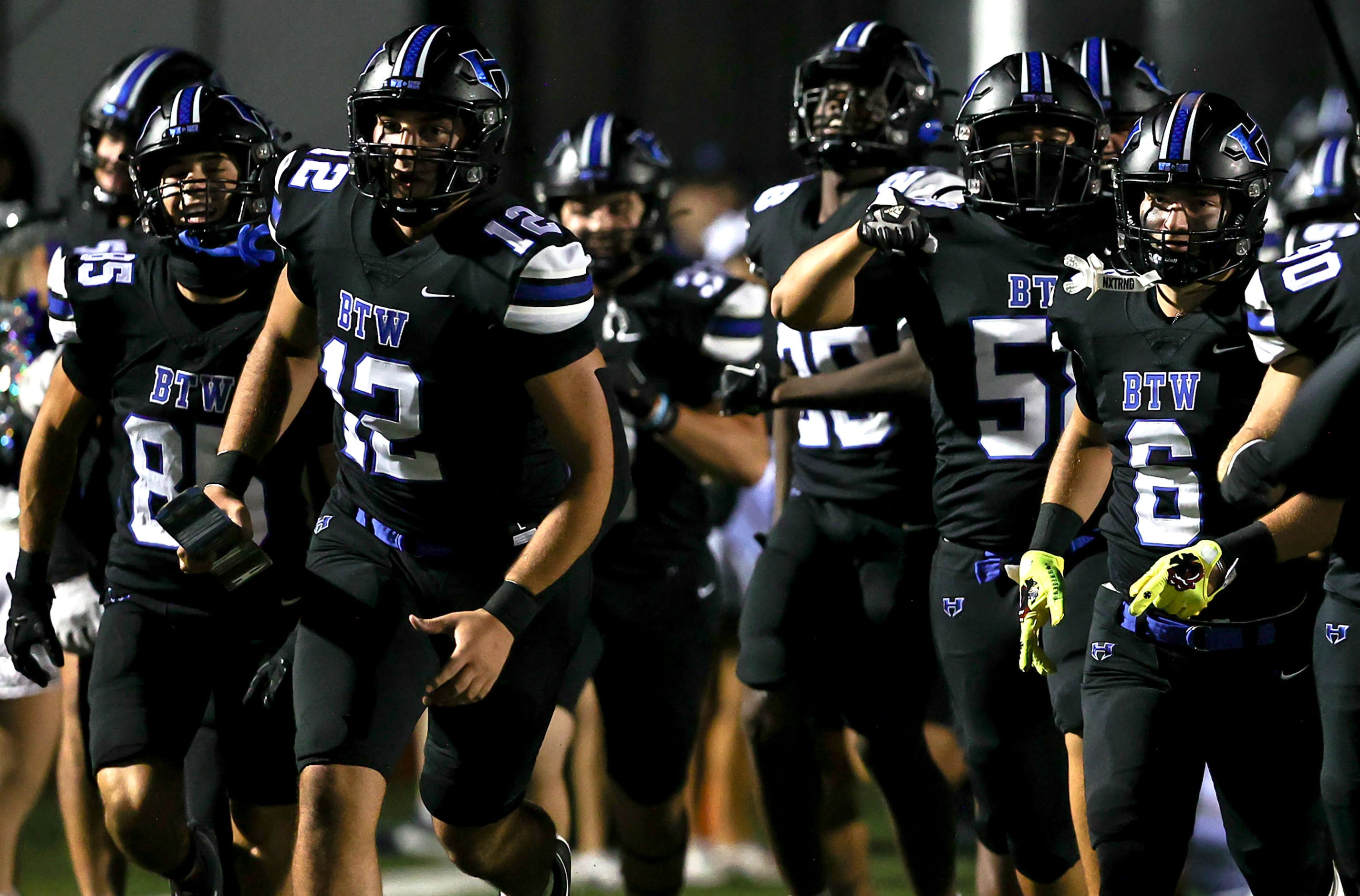 The Hebron Hawks enter the field to Flower Mound  in a District 5-6A high school football...