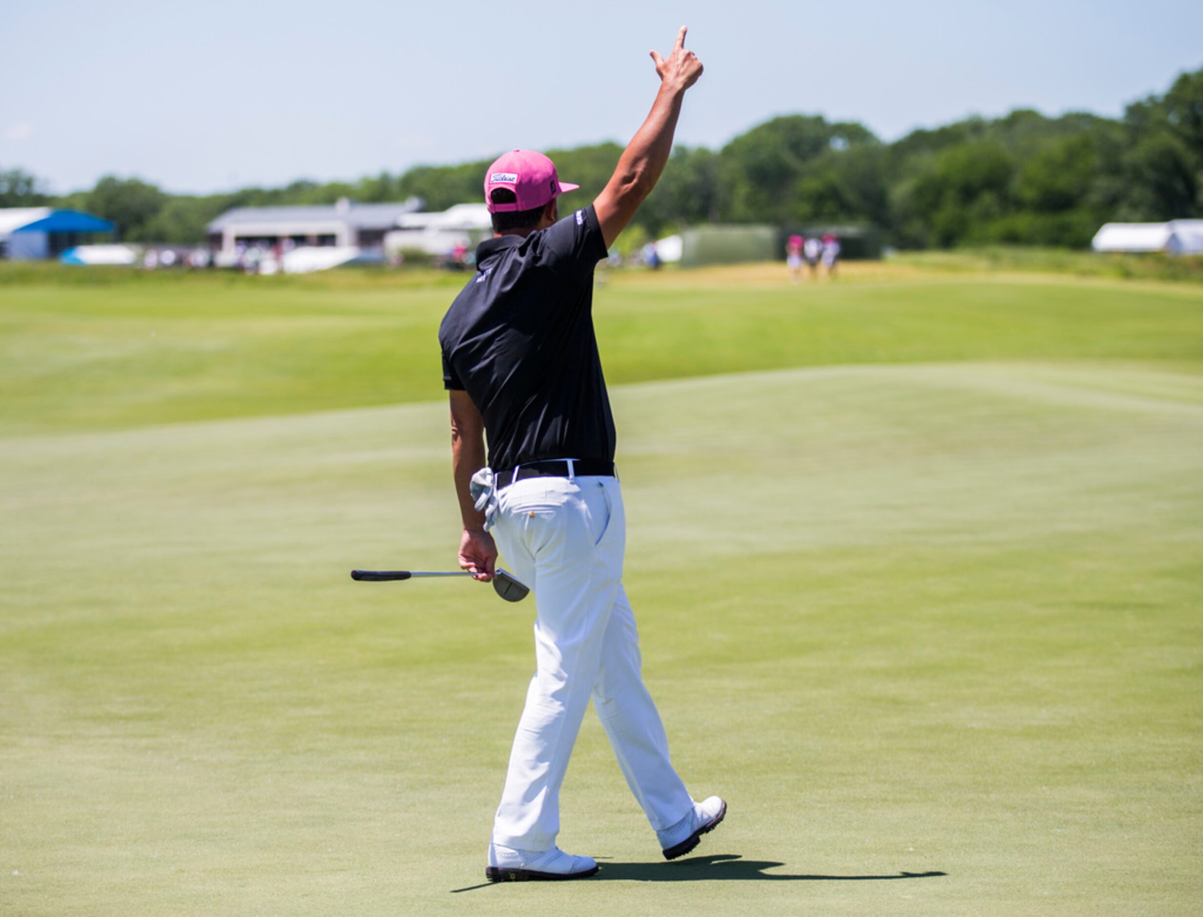 Scott Piercy celebrates after sinking a putt on hole 3 during round 4 of the AT&T Byron...