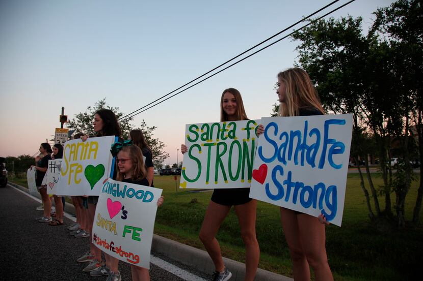 Well-wishers welcomed Santa Fe High School students as they returned to classes after the...