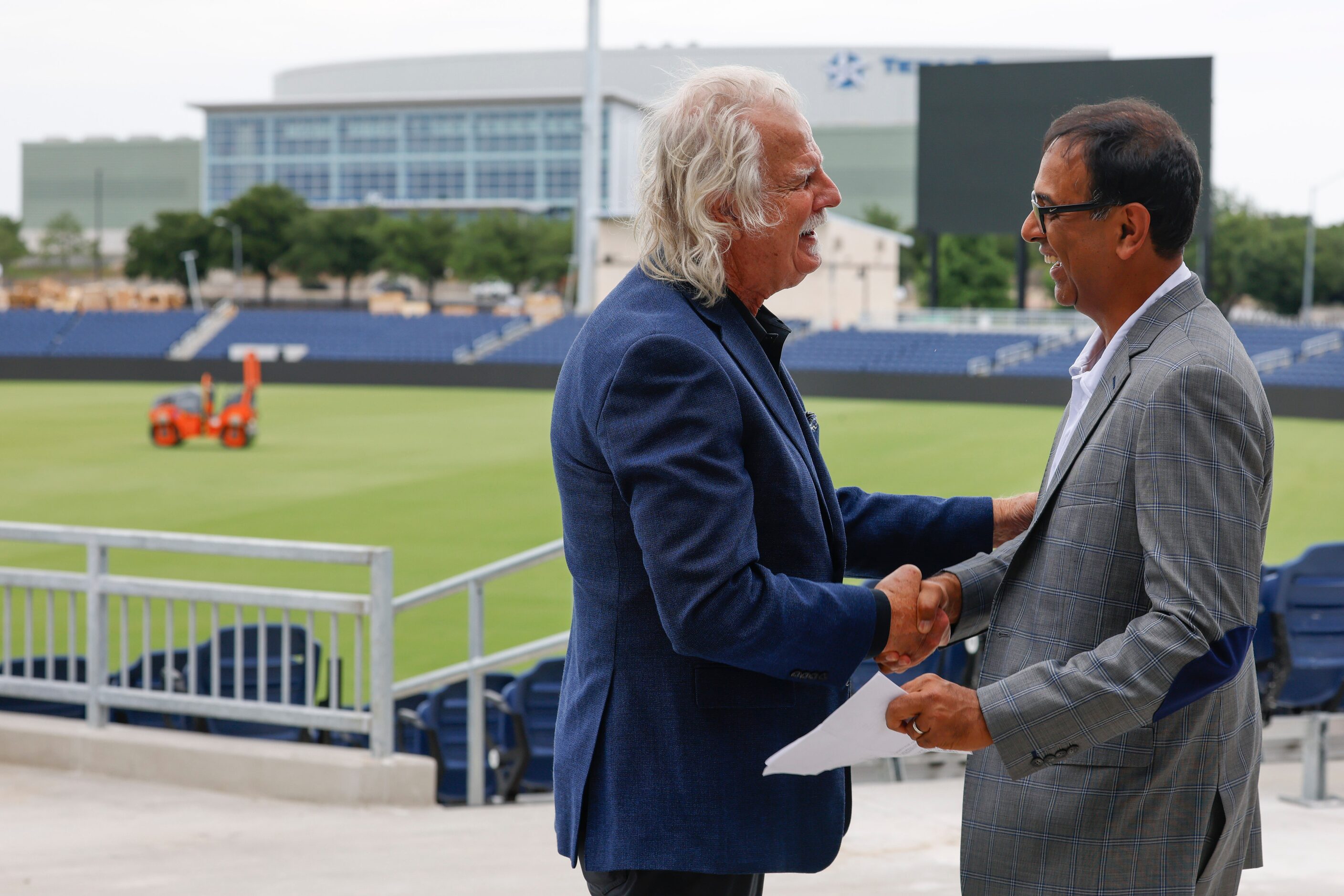 Mayor of Grand Prairie Ron Jensen (left) welcomes Major League Cricket co-founder Vijay...