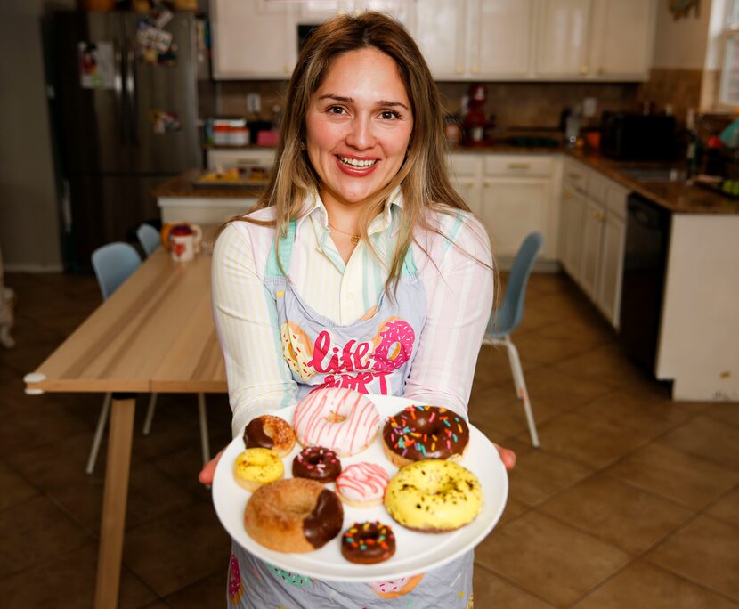 Sinless Donut owner Connie Dennis with an assortment of donuts in Fort Worth