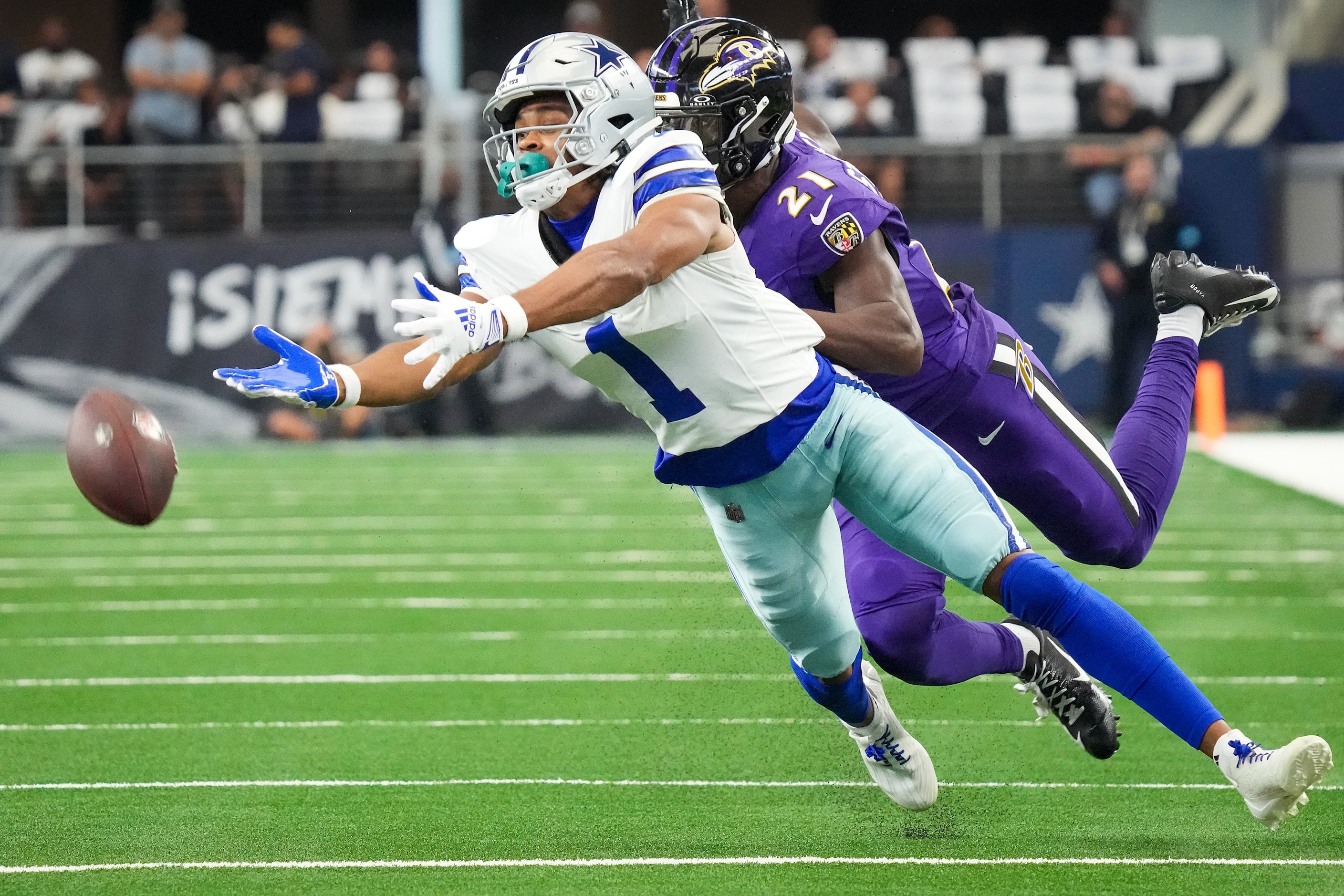 A pass by Dallas Cowboys quarterback Dak Prescott goes out of reach for wide receiver Jalen...