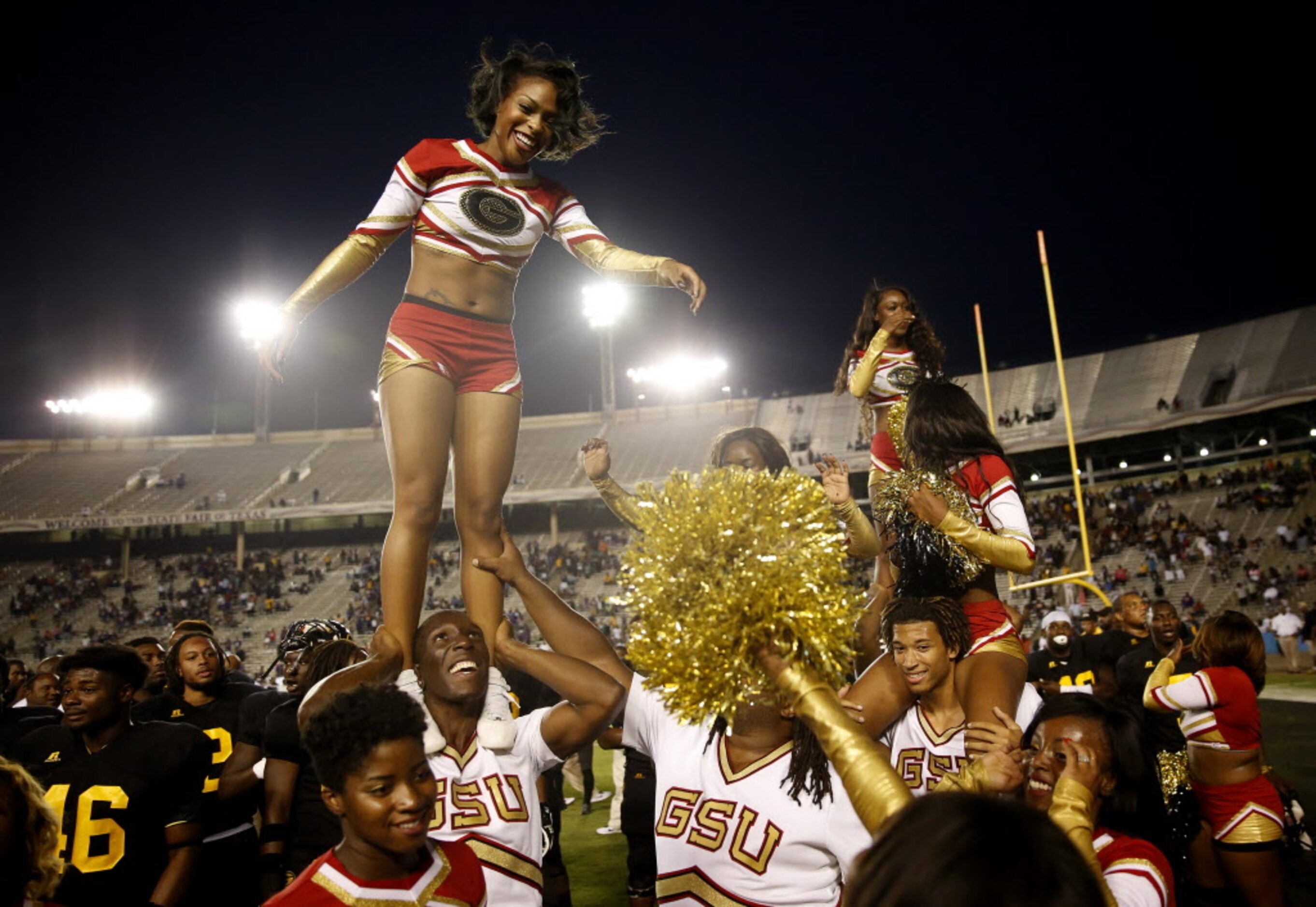 Grambling State cheerleaders celebrate after beating Prairie View A&M 26-20 during a college...