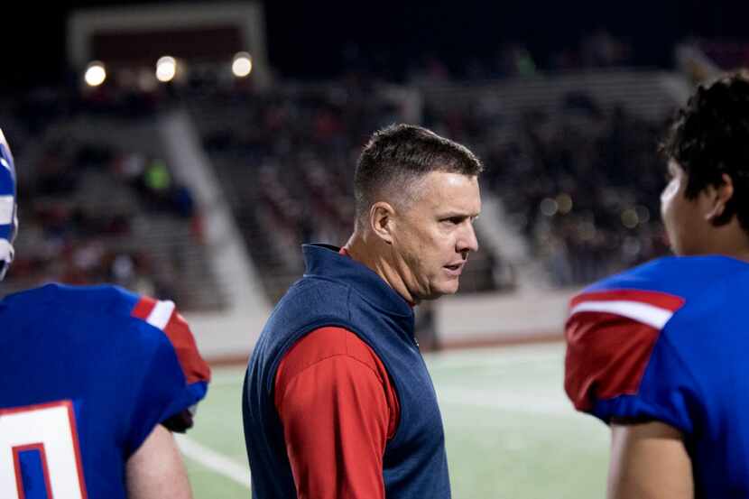 Grapevine head coach Randy Jackson keeps his team focused in the fourth quarter of...