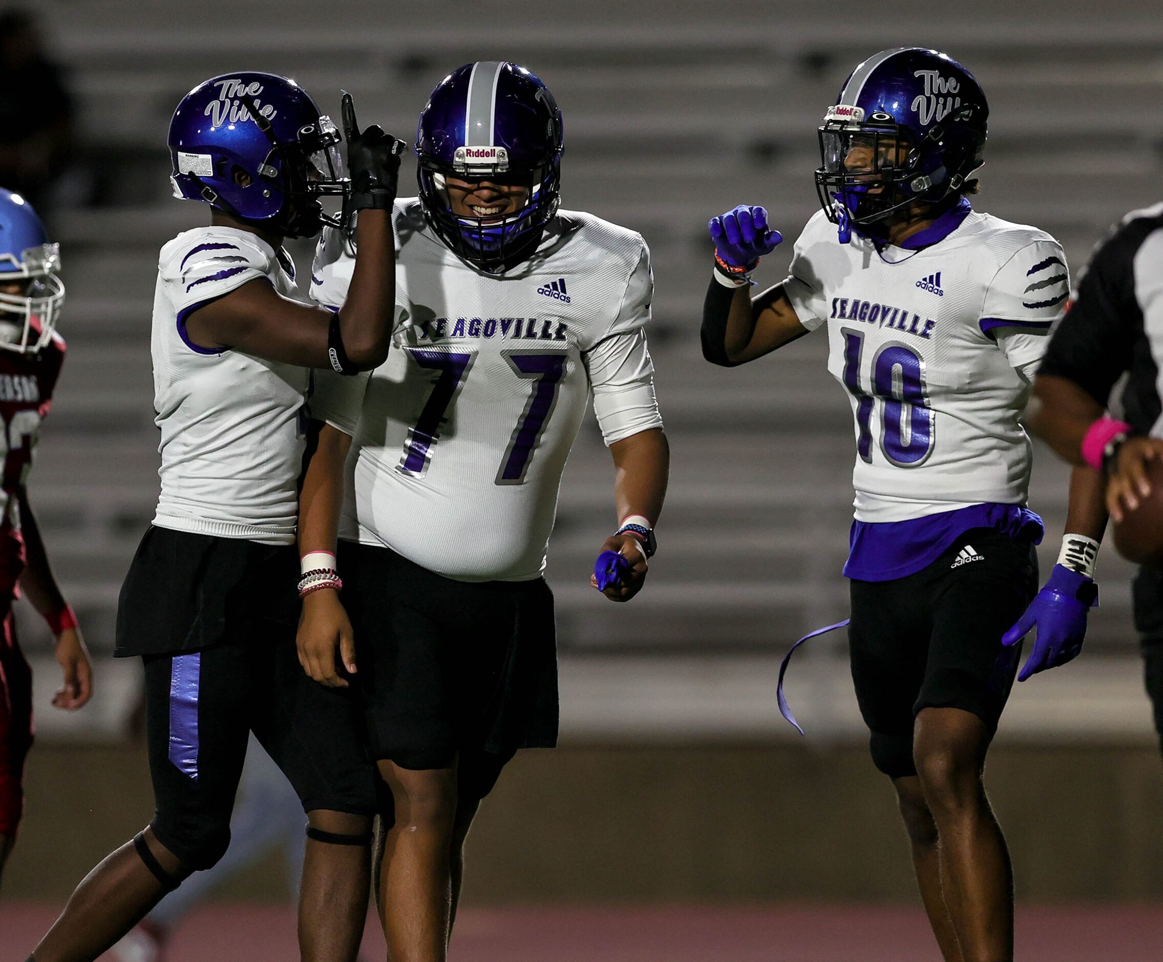 Seagoville wide receiver Brycen Lewis (10) celebrates with his teammates after scoring a...