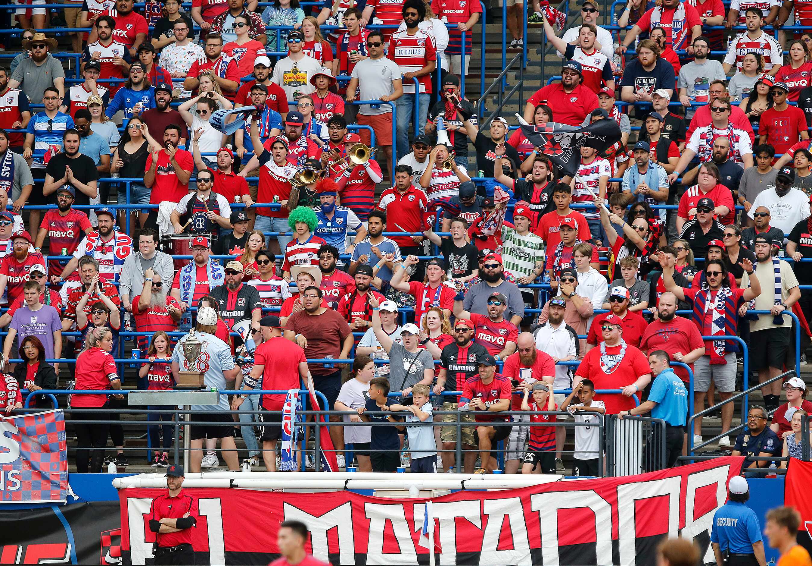FC Dallas fans cheer their team on during the first half as FC Dallas hosted Houston Dynamo...