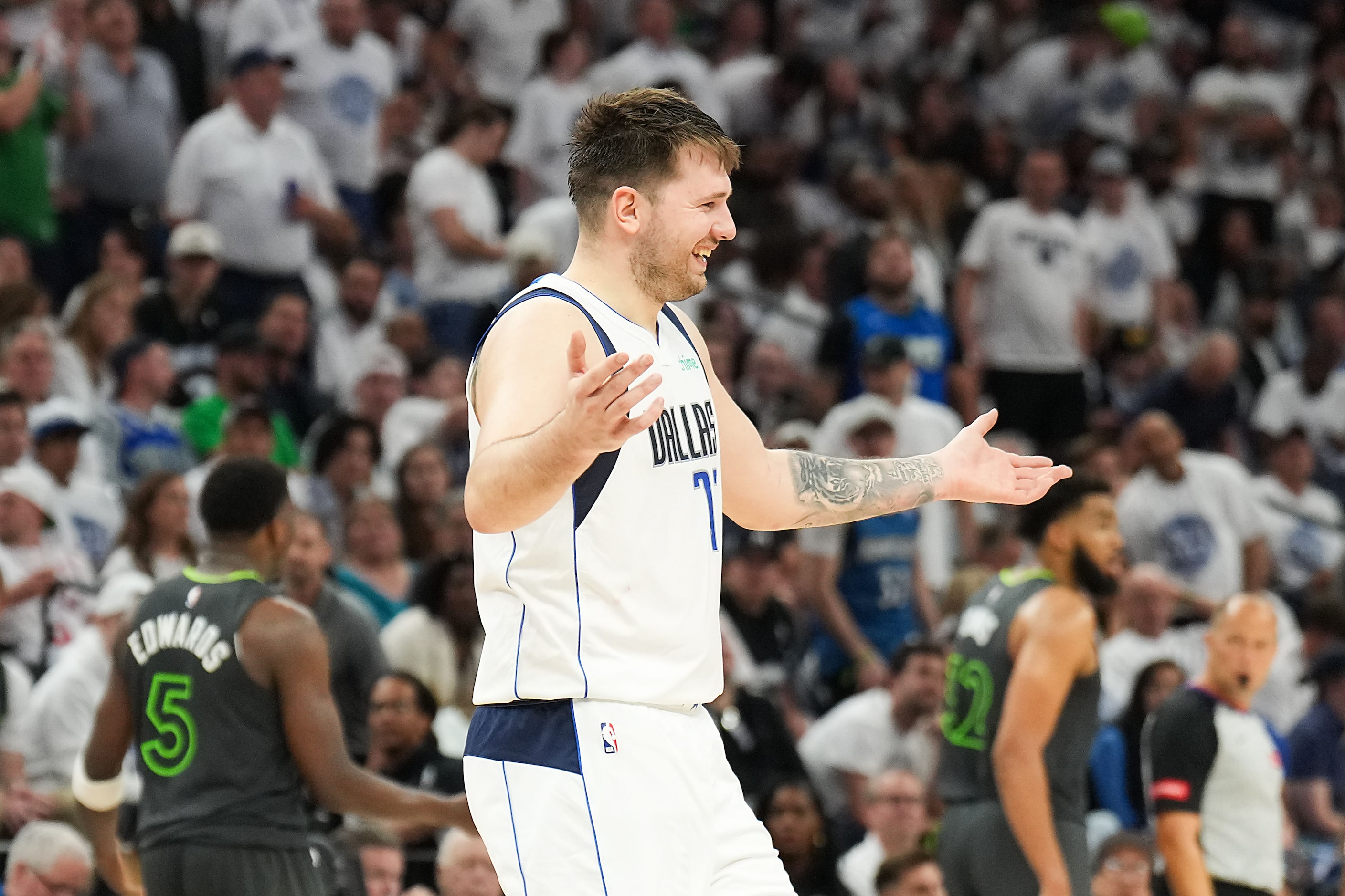 Dallas Mavericks guard Luka Doncic (77) celebrates a basket during the second half in Game 5...