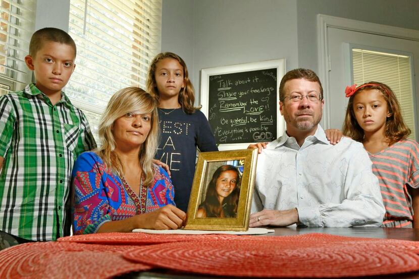 
David and Norma Walker of Garland, with their children (from left) David Jr., 11, Daisy,...